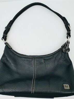 The Sak Baggett hobo. Pebbled leather. Silver-tone hardware. Slouchy Y2K style